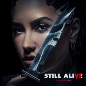Demi with a knife